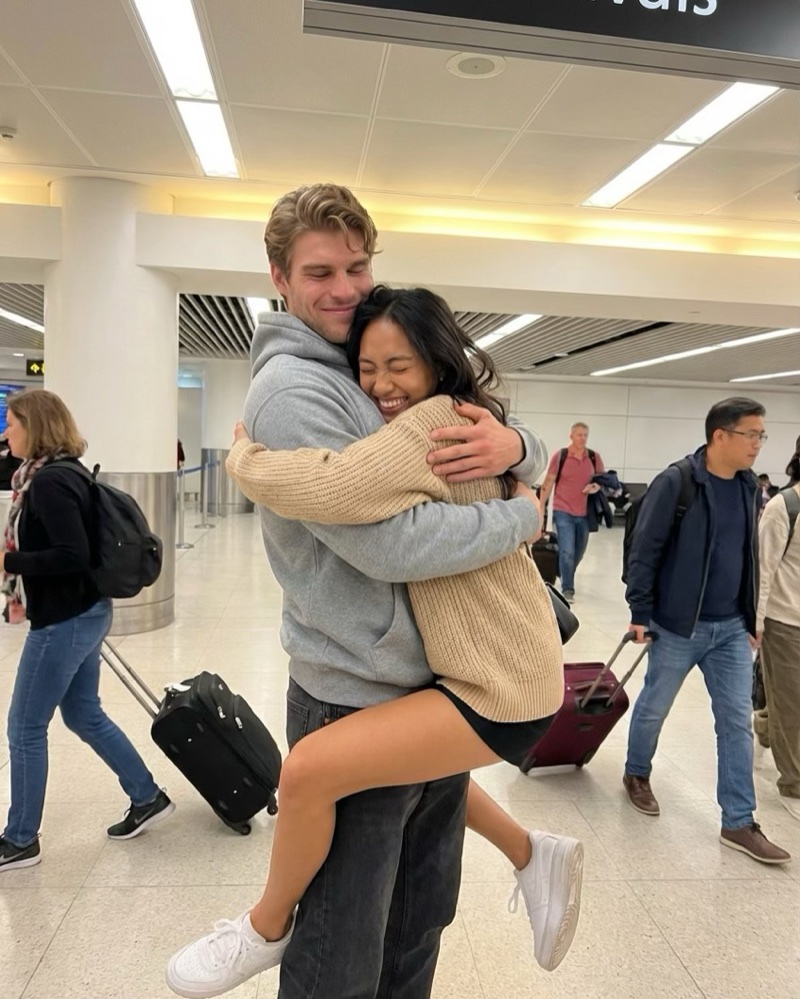 Riley and Paula reuniting with a hug at the airport